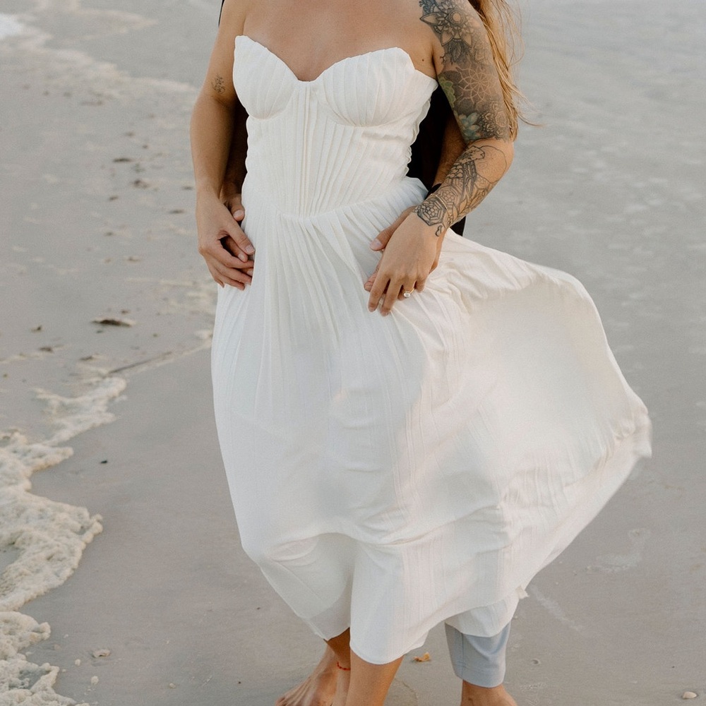 House of CB dress! Color is off white. Very comfortable and true to size (M).